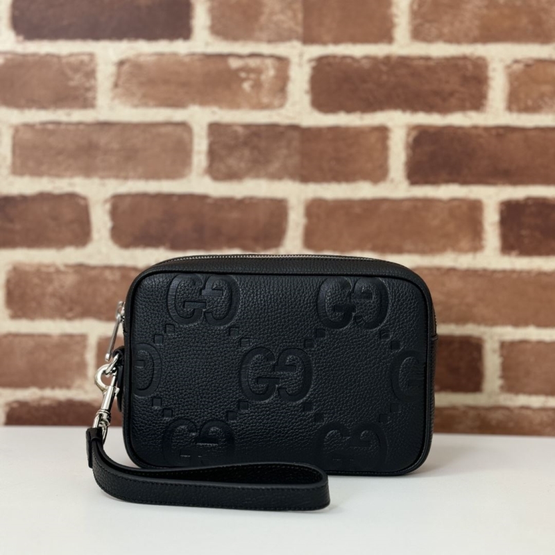 G*u*i clutch bags